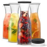 JoyJolt front view showing four glass carafes and gift box, stylish serving benefit