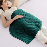 Kaisa front view showing leaf-shaped blanket and packaging, enhances décor