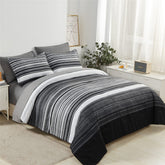 KAKIJUMN front view of grey striped comforter set showing coordinated bed-in-a-bag look and instant style