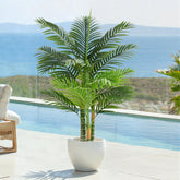 Keeplush front view in pot showing lifelike palm and instant tropical style