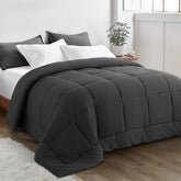 KELTARO front view showing full oversized drape and polished finish