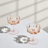 Khen front view of pink coupe set showing vintage petal silhouette and charm