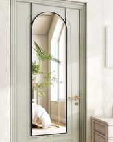KOMCOTE front view arched mirror showing full-body reflection and space benefit