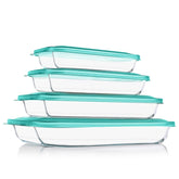 KOMUEE front view of four glass pans and green lids showing full set and benefits