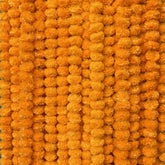 Krati Exports front packaging showing ten 5ft marigold garlands and benefits of reusable décor