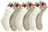 Kunyida front view of six khaki and ivory stockings showing set and colors