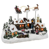Kurt S. Adler front view of LED village showing animated scene and festive glow