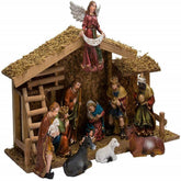Kurt S. Adler wooden stable front view showing complete nativity scene, adds traditional warmth