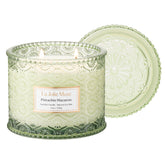 LA JOLIE MUSE front view of pistachio macaron candle, elegant décor impact