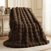 L'AGRATY cocoa brown folded front view showing plush pile and cozy appeal