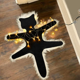 LARFOEK front view of lighted fried cat rug adding warm holiday ambiance