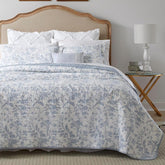 Laura Ashley Amberley Blue front view showing reversible design and cozy bedroom styling