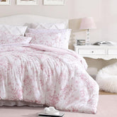 Laura Ashley front view of Delphine Pink comforter set showing full floral design for stylish bedding