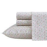 Laura Ashley Evie Pink front view showing floral bedding and retail look