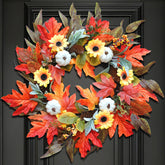 Lckaien wreath on front door adding welcoming autumn color