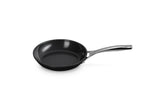 Le Creuset 8-inch pan front view showing sleek profile and durable finish for easy cooking
