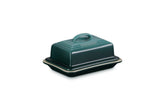 Le Creuset butter dish front view showing Artichaut color and covered protection