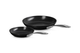 Le Creuset front view of both fry pans showing sizes and polished finish, reliable performance