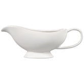 Le Creuset white gravy boat front view shows elegant shape and durable glaze