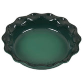 Le Creuset Heritage pie dish front view showcasing durable glaze and even heat benefit