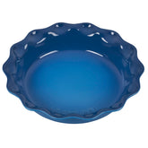 Le Creuset Heritage Pie Dish front view showing scalloped rim and Marseille color, elegant serving