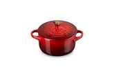 Le Creuset mini cocotte front view showing Cerise color and festive appeal