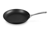Le Creuset front view of 12-inch PRO fry pan showing durable finish and elegant profile for reliable cooking