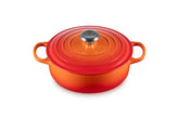 Le Creuset front view showing flame enamel and wide base for even heating