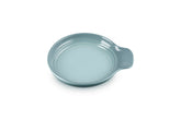 Le Creuset front view spoon rest showing Sea Salt finish and tidy counter benefit
