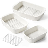 LE TAUCI front view of three white ceramic dishes showing handles and nests, attractive serving