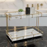 Léazora front view showing white marble shelves and gold frame, elegant storage benefit
