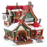 Lemax Elf Workshop front view showing lit windows and colorful facade for festive impact