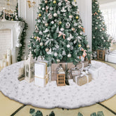 Libima full tree view with skirt framing gifts and adding elegance