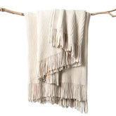 lifein throw blanket front view showing neutral cream color and neat drape for style
