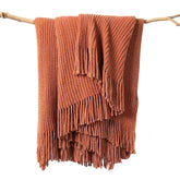 lifein front view rust throw showcasing cozy color and couch benefit