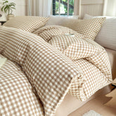 LifeTB front view of tan gingham comforter showing cozy plaid and neat stitching benefit