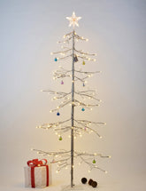 LIGHTSHARE 6ft snowy fir front view showing warm-white LEDs and frosted branches for cozy decor