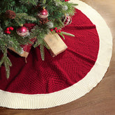 LimBridge front view of red knit tree skirt showcasing classic white edge and festive look