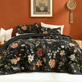 Litanika front view of quilt on bed showing bold floral print and bright colors