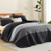 Litanika quilt front view showing black and white stripes and polished look