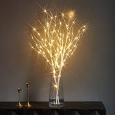 LITBLOOM full product display showing illuminated branches and warm ambience