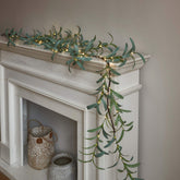LITBLOOM garland front view showing full 6-foot length and warm glow