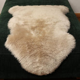 LLB front view of cream-brown sheepskin rug showing plush texture and decor benefit