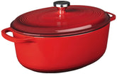 Lodge oval Dutch oven front view showing red exterior and lid, stylish serving benefit