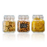 LOOIOOJ front view of three square glass jars showing clear bodies and clamp lids for neat storage