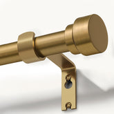 Lootkell front view curtain rod showing warm gold finish and decorative appeal