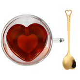 Lucy Sui heart mug front view showing clear double‑walled design and charm