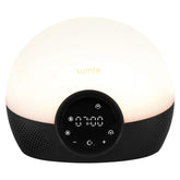 Lumie Bodyclock Glow 150 front view showing warm LEDs and compact design, promotes gentle wakeups