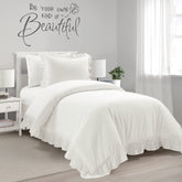 Lush Decor Reyna front view on twin XL bed showing ruffled border and crisp white look for instant style