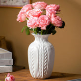 Lvases front view of matte wheat-textured vase showing sculptural silhouette and neutral tone